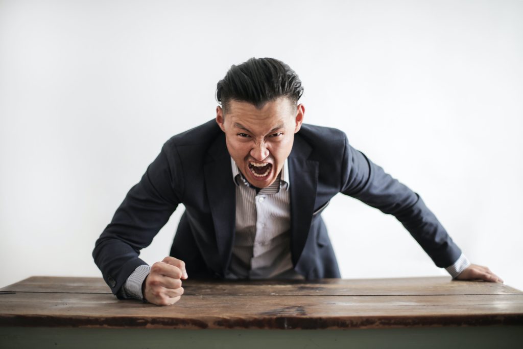 Photo by Andrea Piacquadio: https://www.pexels.com/photo/mad-formal-executive-man-yelling-at-camera-3760790/